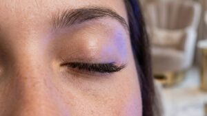 High-precision LED gel lash extensions treatment for sensitive eyes at LASHTOUCH Midtown NYC