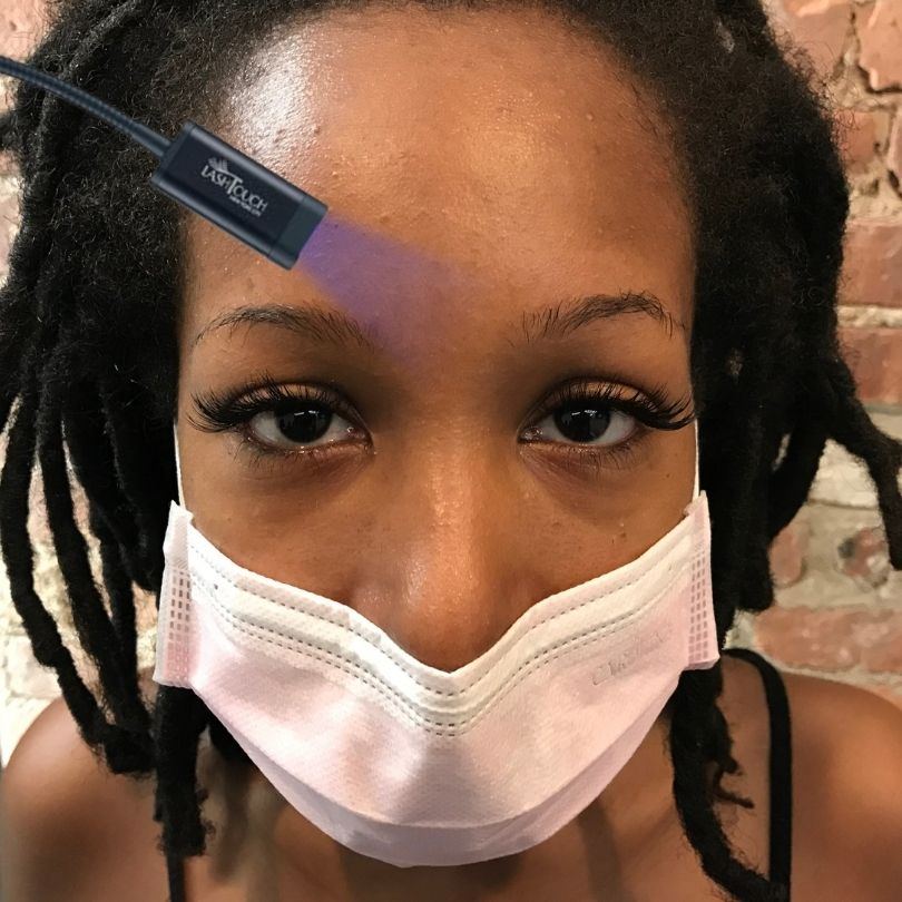 Hybrid volume lash extensions application using gentle LED gel curing system at LashTouch NYC